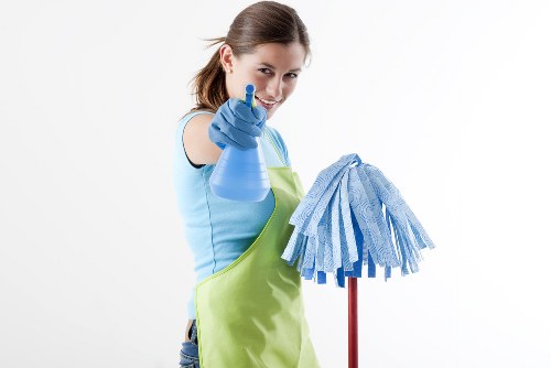 Carpet cleaning team preparing equipment safely before service