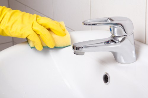Preparing a carpeted room in Kentishtown for hot water extraction cleaning